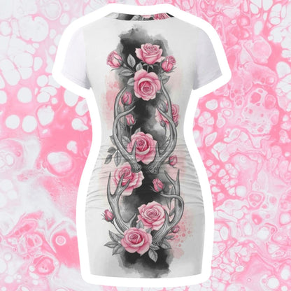 The Gift Dimension white bodycon mini dress with pink roses and antlers graphic print on back.